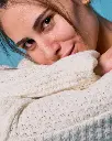 isa_white_blouse_close.webp
